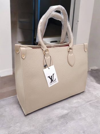 Louis Vuitton bela ženska torbica